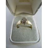 9ct Yellow Gold fancy diamond cluster ring with 21 various size Brilliant cut diamonds Size UK P USA