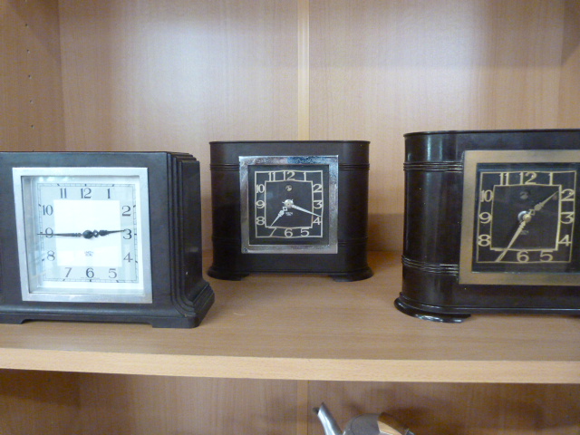 Three Art Deco bakelite electric clocks