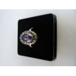 Vintage silver Amethyst and marcasite ring. the approx 10mm x 6.3mm stone is a little rubbed on