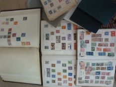 Box containing various stamp albums from around the World and English