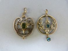 two 9ct Gold Lovehearts. The circular shaped one is approx 24mm in diameter and set with 2 pale blue