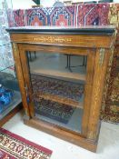 Freestanding Mahogany display cabinet with floral inlaid to front and spelter decoration. Inside