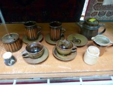 Collection of David Winkley Vellow pottery - tea set and jars with covers