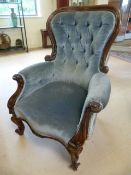 Light blue button back nursing chair with mahogany frame on curved scroll feet