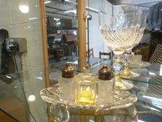 Small glass condiment set with hallmarked silver tops and a cut glass rummer