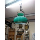 Green Baluster hanging centre oil light with cast iron frame and chain to hold up