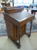 Mahogany Devenport with four false drawers to one side and four opening drawers to the other. Set of