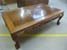 Chinese Rosewood coffee table inlaid with mother of pearl depicting dragons amid clouds. Pierced