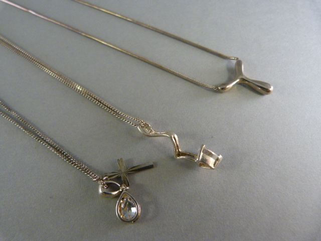 Three boxed silver pendants on chain (2CZset)