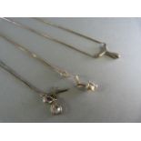 Three boxed silver pendants on chain (2CZset)