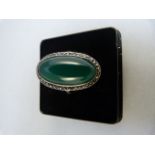 Vintage silver Paste Green Chalcedony and marcasite ring. The Central stone measures approx 22mm x