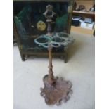 Cast iron umbrella stand in the manner of Coalbrookdale, with large single bowl tray to bottom of