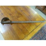 Straight bladed possibly middle eastern sword with copper and brass handle grip