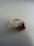 9ct Yellow gold 1970's Garnet Ring (approx 9mm x 7mm cabachon stone) UK - L USA - 5.5 Gross weight