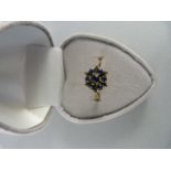 9ct Yellow Gold sapphire starburst cluster ring centre stone approx 3.1mm in diameter with 6