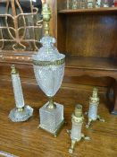 A selection of Art Deco cut glass table lamps to include a matching pair and a large trophy shaped