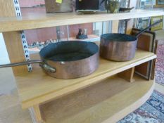 Two large copper pans one is 46cm diameter and the other 33cm