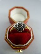 18ct Gold ring set with 5 diamonds in an illusion setting