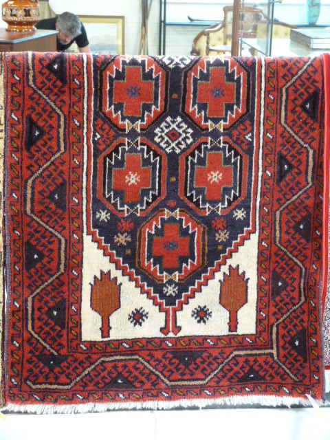 Persian Buluchi red ground tribal rug 195cmx 103cm