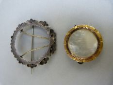 Two coin mounts - 1 Silver Victorian Crown mount approx 45mm in diameter and a 9ct sovereign mount