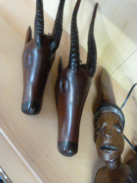 Two carved African Antelope heads, a carved African lamp base and carved African sculpture - Image 5 of 8