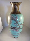 An oriental Cloisonne Turquoise ground vase - decorated with dragons, some losses and damage - to