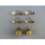 Pair of 9ct Gold screw back cultured pearl earrings, one with approx 8mm pearls and the other with