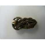 Silver Marcasite and a 5.5mm Cultured pearl dress clip approx 33mm long x 18.5mm at the Widest part