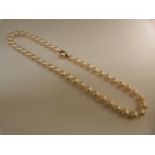 Freshwater cultured pearl necklace. 18" long approx 9.75mm pearls with 9ct Gold clasp by Metall
