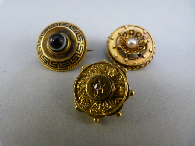 Three small victorian brooches set in yellow metal (unmarked gold?) 1 approx 17.3 diameter central