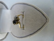 9ct Yellow Gold Black and white CZ stone cross over ring - Size UK G and 3.25 uSA Gross weight 1.3g