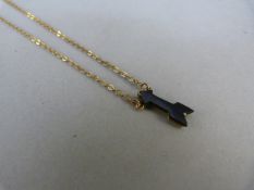 9ct Gold black onyx cupids arrow pendant approx 15mm x 4.75mm wide on a 15" chain Gross weight 1.7g