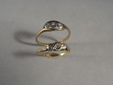 Two three stone diamond illustion set rings - 1 in 18ct Gold and 1 in 9ct gold - Weight approx 3 g