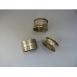 Three napkin Rings - two hallmarked silver (weight - 23g)