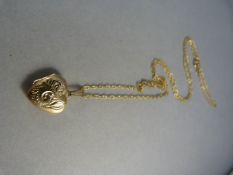 9ct Gold heart locket on a fine 9ct hallmarked chain