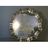 Silver Salver on three scrolled feet hallmarked London 1911 by Thomas Bradbury & Sons Ltd Approx.