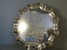 Silver Salver on three scrolled feet hallmarked London 1911 by Thomas Bradbury & Sons Ltd Approx.