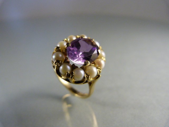 9ct Gold Amethyst and Pearl Ring. Central oval amethyst approx 10mm x 8mm surrounded by 10 approx - Image 2 of 3