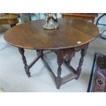 Oak gate leg table with single drawer