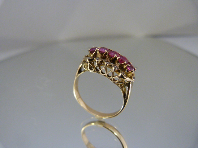 14k Ruby and CZ Ring - Five ruby stones surrounded by small CZ stones UK - N1/2 USA - 6.75 Approx