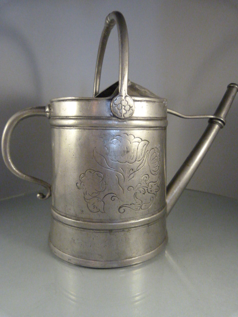 Unusual decorative Pewter watering can with floral decoration to sides with a singular animal