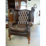 Burgundy leather button back fire side armchair