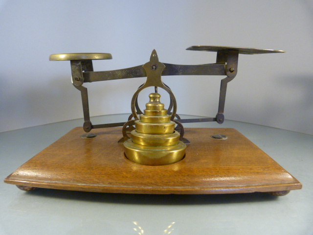 Set of Brass Postage scales sat on an oak base with full set of brass weights - To one of the