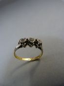 18ct Gold ring with three diamonds in heart shaped settings