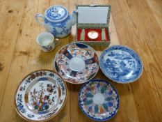 An oriental blue and white teapot and other dishes etc