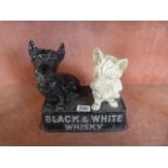 Buchanans cast iron Whisky dogs sat on rectangular plinth "Black and White Whisky"