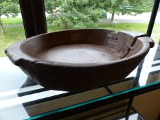 Large antique oak mixing bowl with previous restoration of Large metal staples