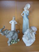 Lladro figure of a girl sitting in original Box along with another. a Nao figure and a figure of