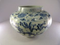 Chinese Blue and White Melon shaped vase depicting Peach Blossom to one side and Black pine to the