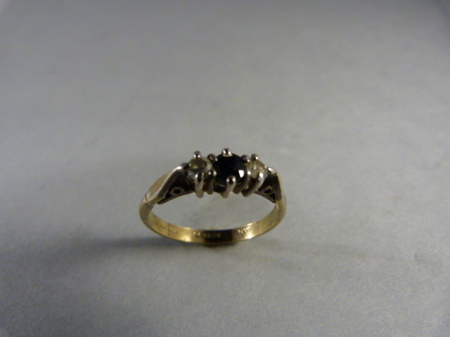 3 Stone sapphire and CZ Ring